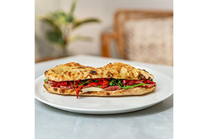 Italian Style Panini- Mozzarella, salami, capsicum, olives, rocket, option: mayonnaise