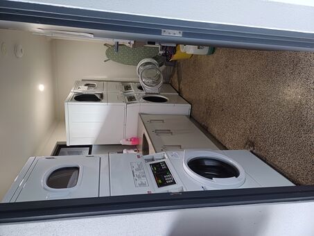 Shared coin operated laundry | Shared coin operated laundry | Queen Bed Room Accomodation - Alberts Innisfail QLD